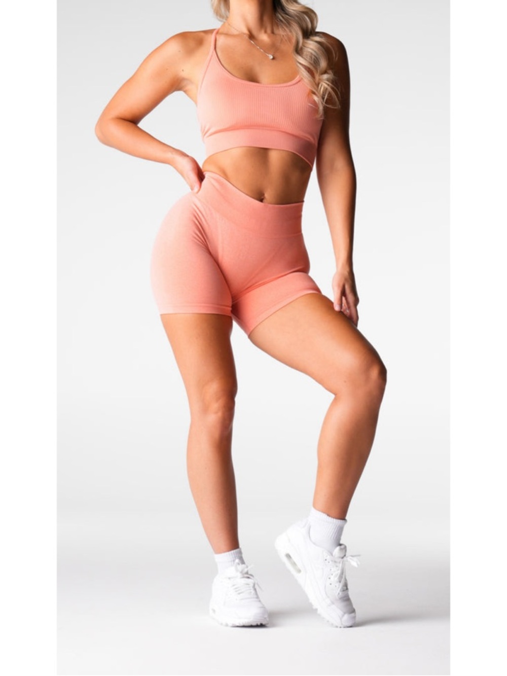 NVGTN Peach Mid Rise Pro Seamless Shorts
